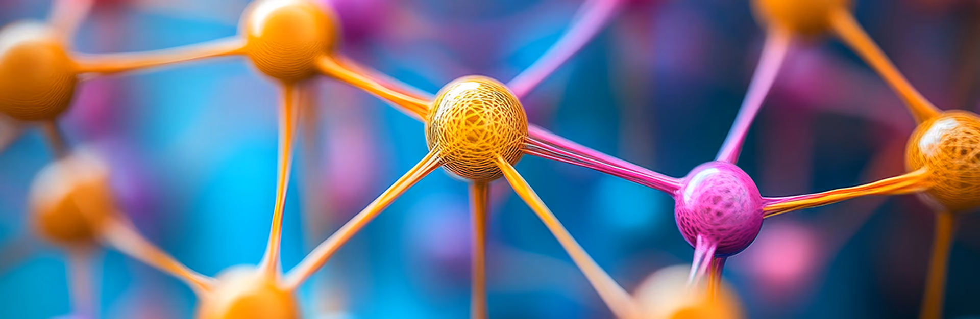 Close-up of colorful interconnected spheres representing a molecular or neural network.